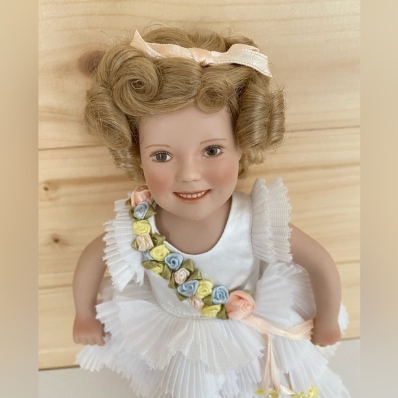 MBI Porcelain Shirley Temple 10” Doll “Baby Take a Bow” Ruffled White Dress - Picture 3 of 10